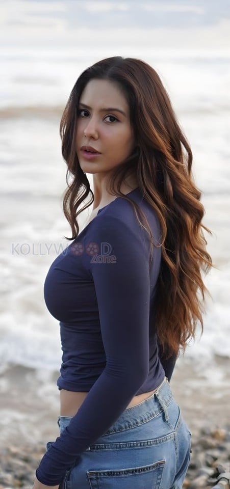 Sexy Sonam Bajwa in a Long Sleeve Crop Top and Denim Pant at the Beach Photos 03