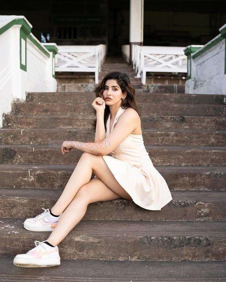 Sizzling Beauty Sakshi Malik in a Short White Dress Pictures 03