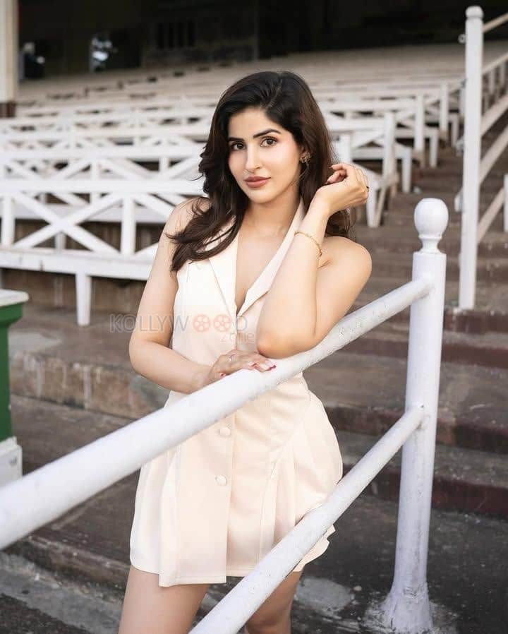 Sizzling Beauty Sakshi Malik in a Short White Dress Pictures 06