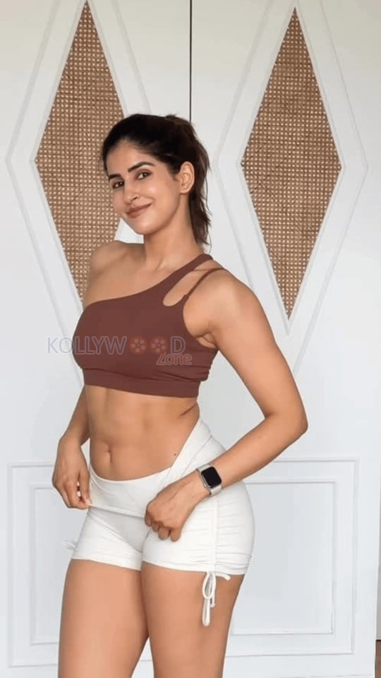 Stunning Sakshi Malik in an One Shoulder Nude Yoga Bra Shorts Photos 01