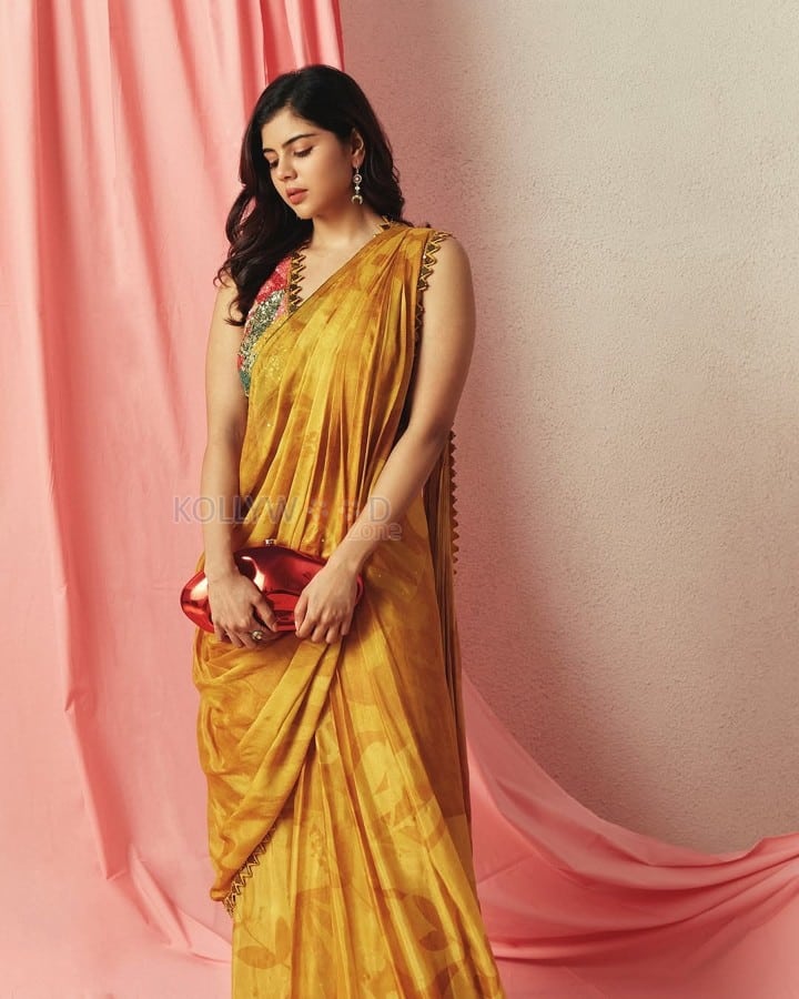 Beautiful Kalyani Priyadarshan in a Yellow Mustard Saree with a Sleeveless Blouse Pictures 06