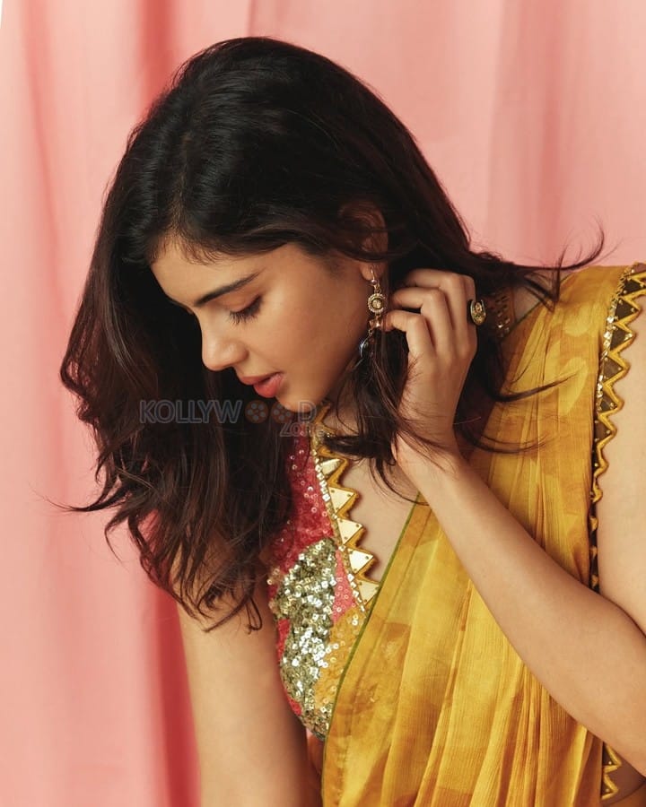 Beautiful Kalyani Priyadarshan in a Yellow Mustard Saree with a Sleeveless Blouse Pictures 07