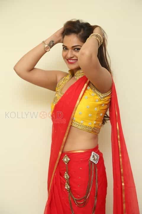 Tollywood Beauty Aswini Red Saree Photos 09