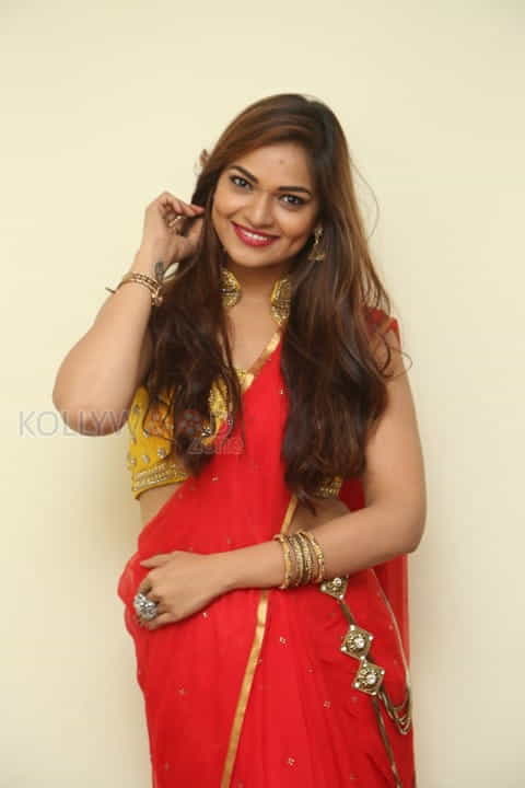 Tollywood Beauty Aswini Red Saree Photos 13