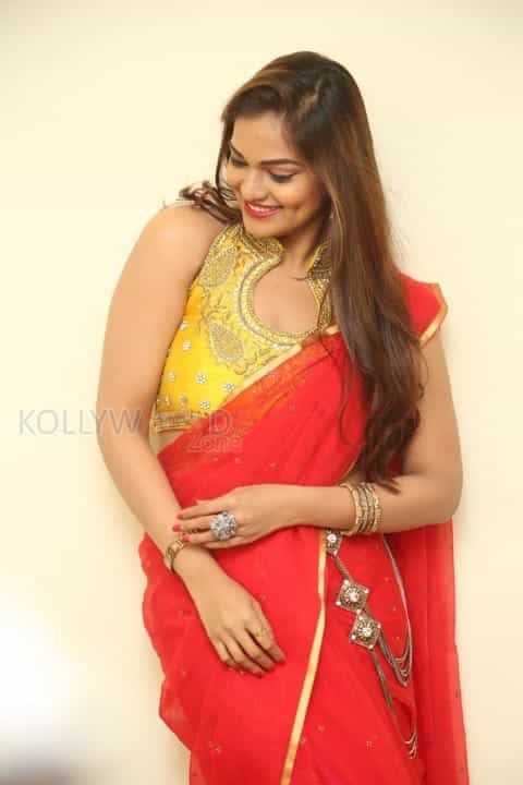 Tollywood Beauty Aswini Red Saree Photos 21