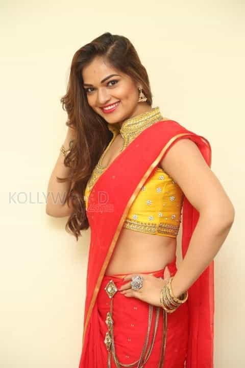 Tollywood Beauty Aswini Red Saree Photos 23