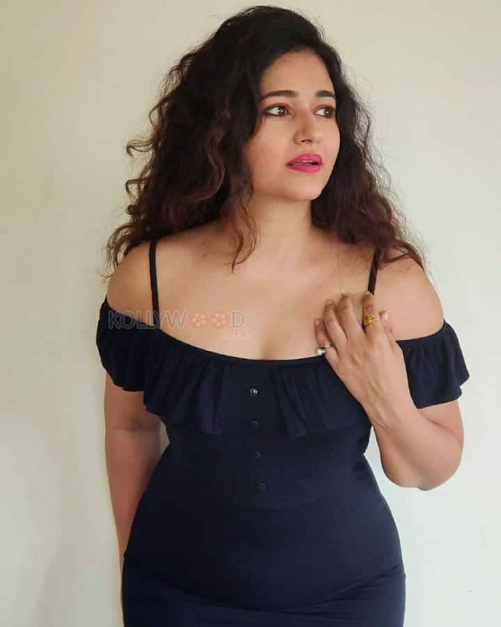 Actress Poonam Bajwa Black Dress Photoshoot Pictures 07