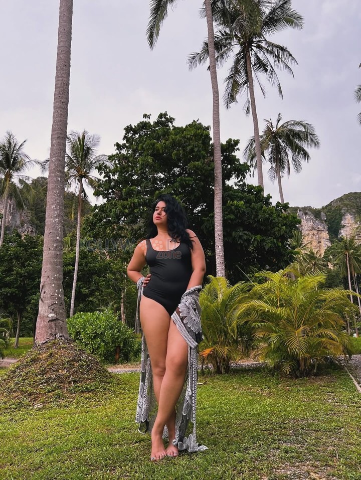 Bold and Hot Poonam Bajwa in a Black One Piece Swimsuit Pictures 01