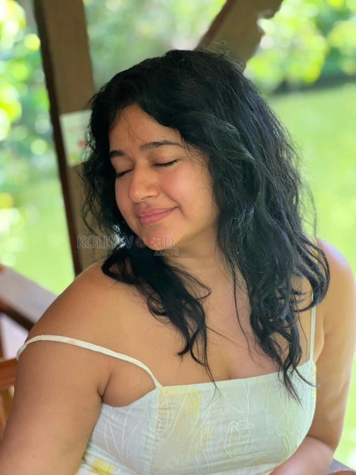 Cute and Beautiful Poonam Bajwa in a White and Yellow Spaghetti Strap Dress Photos 02