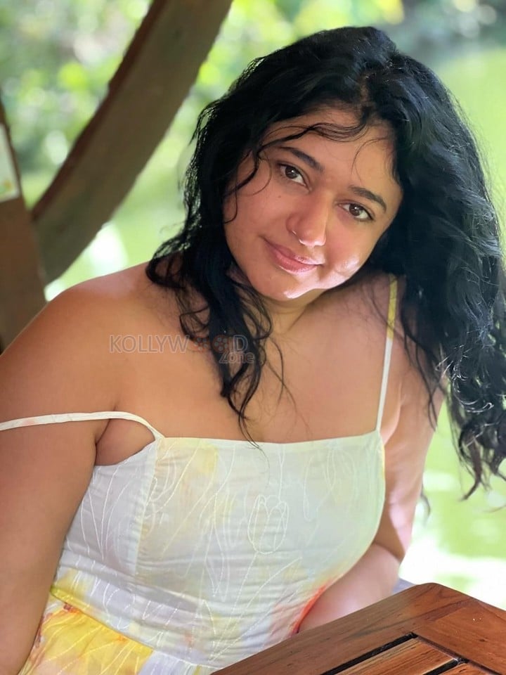 Cute and Beautiful Poonam Bajwa in a White and Yellow Spaghetti Strap Dress Photos 04