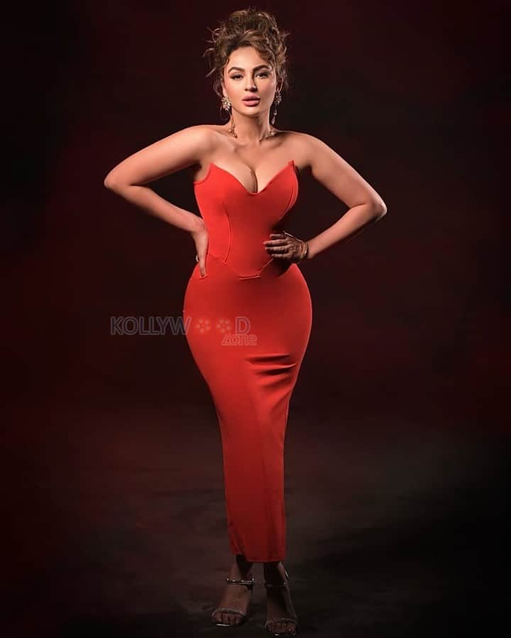 Bold and Seductive Seerat Kapoor in a Red Corset Style Strapless Dress Photos 01