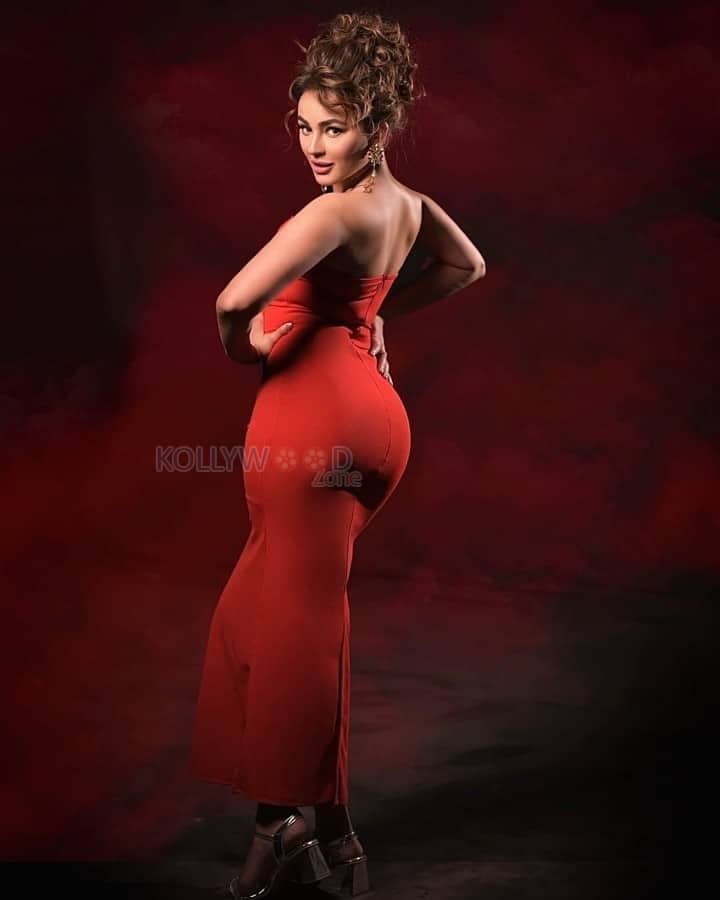 Bold and Seductive Seerat Kapoor in a Red Corset Style Strapless Dress Photos 03