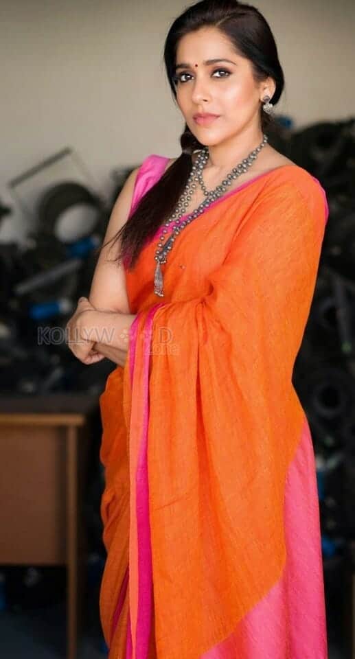 Tollywood Actress Rashmi Gautam in an Orange Saree Photos 01