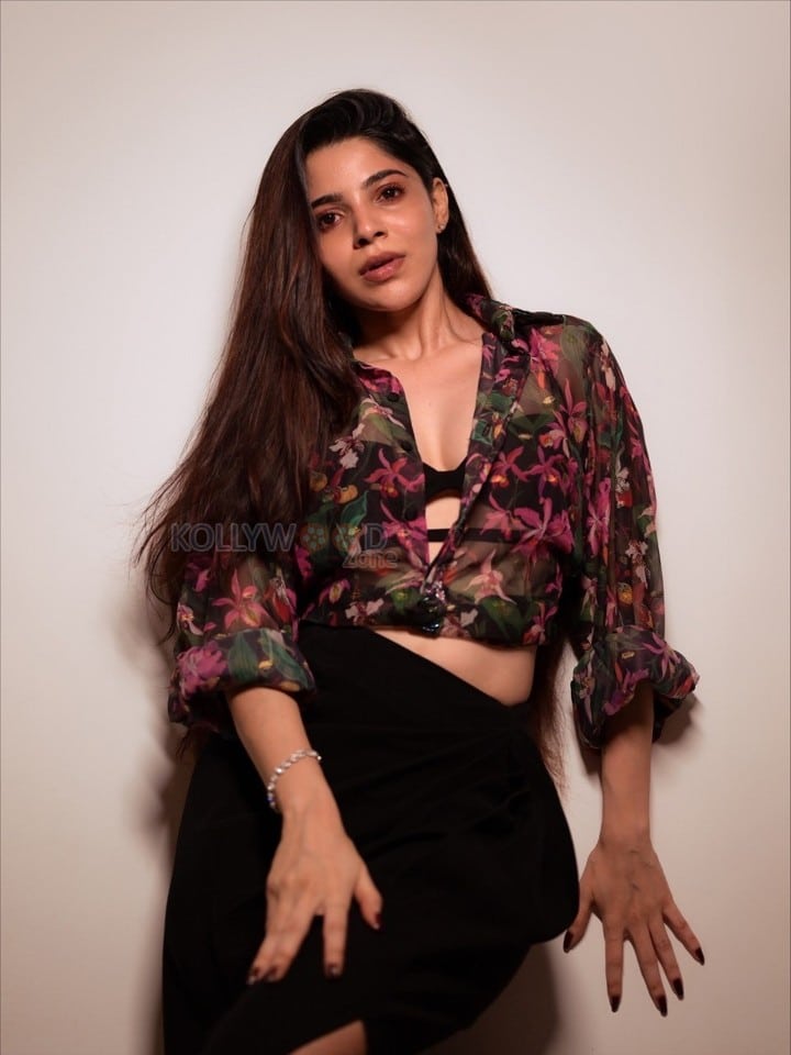 Charming Divya Bharathi in a Floral Printed Sheer Top over a Black Bralette and a Black Skirt Pictures 04