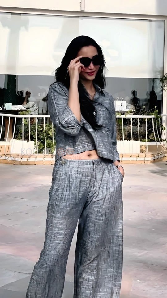 Actress Srinidhi Shetty Navel in a Grey Co Ord Set Photos 01