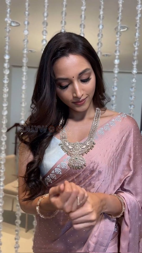Beautiful Srinidhi Shetty in a Rose Gold Saree with a White Sleeveless Blouse Pictures 02