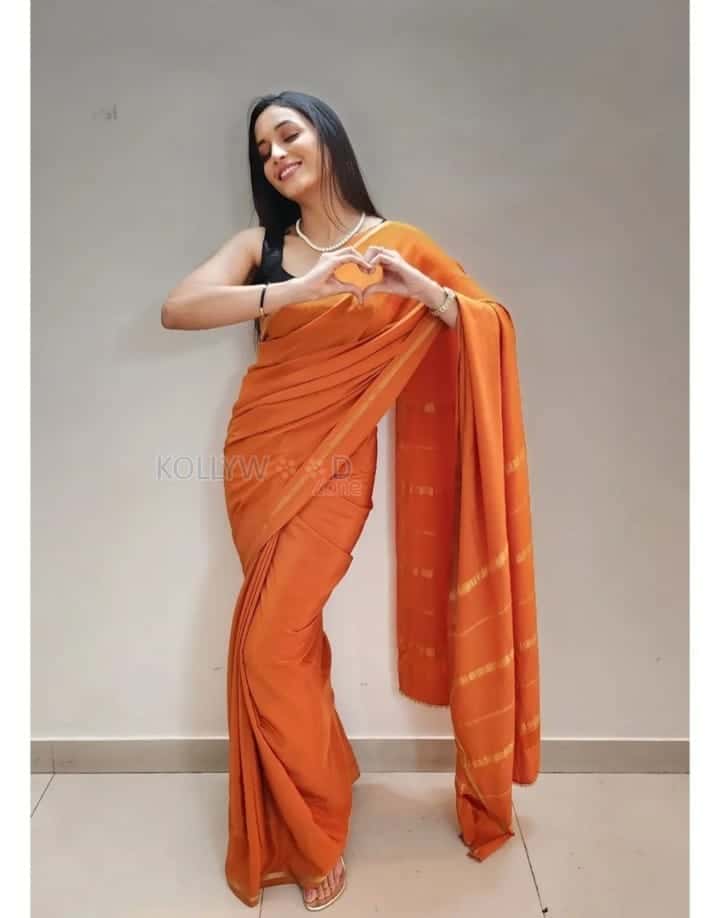 Beauty Srinidhi Shetty in a Vibrant Orange Saree Pictures 01