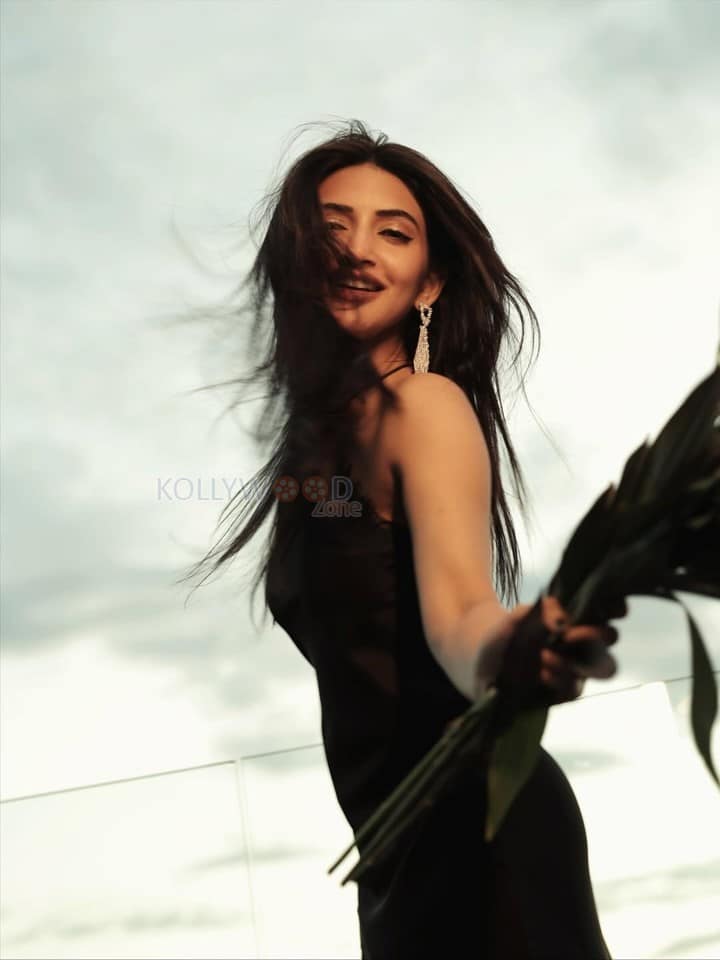 Adorable Sreeleela in a Black Glamour Off Shoulder Dress Pictures 02