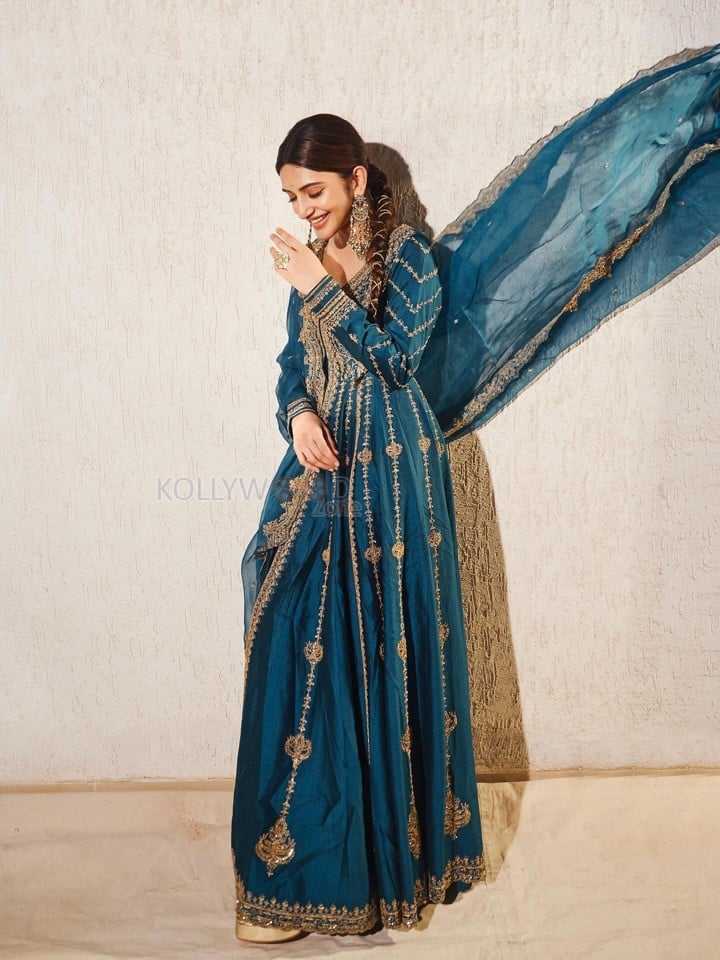 American Born Tollywood Actress Sreeleela in a Teal Blue Traditional Lehenga with Golden Embroidery Photos 03