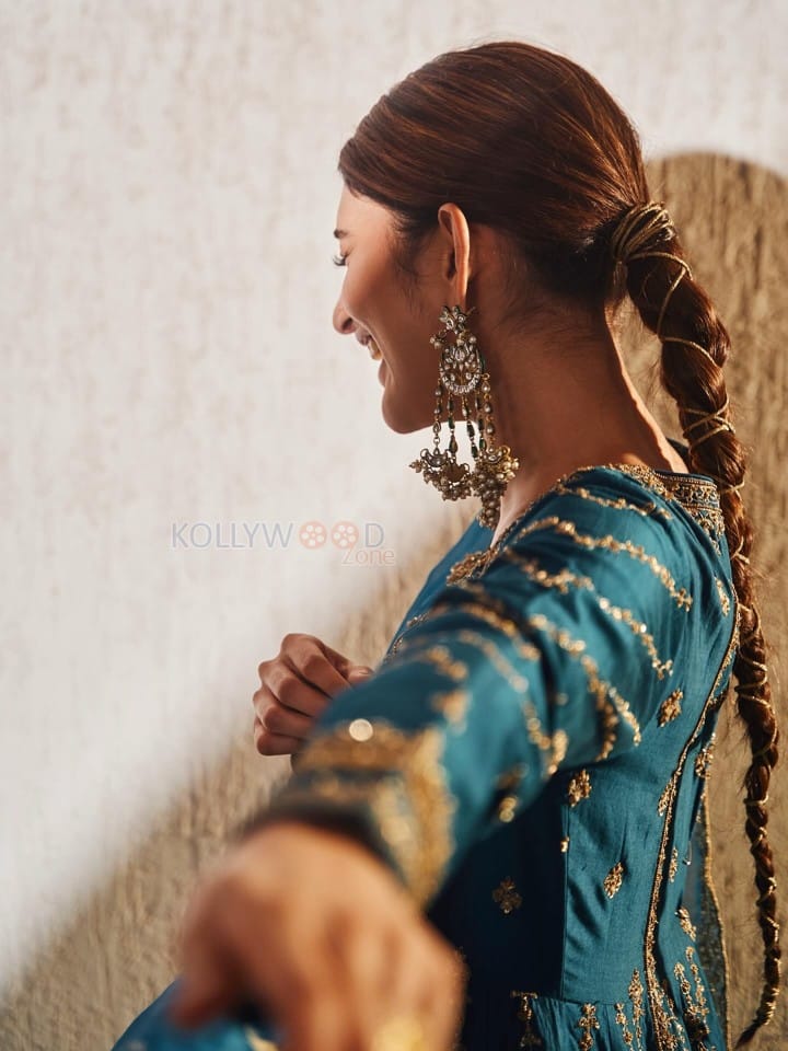 American Born Tollywood Actress Sreeleela in a Teal Blue Traditional Lehenga with Golden Embroidery Photos 07