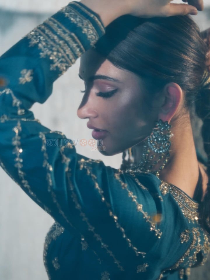 American Born Tollywood Actress Sreeleela in a Teal Blue Traditional Lehenga with Golden Embroidery Photos 08