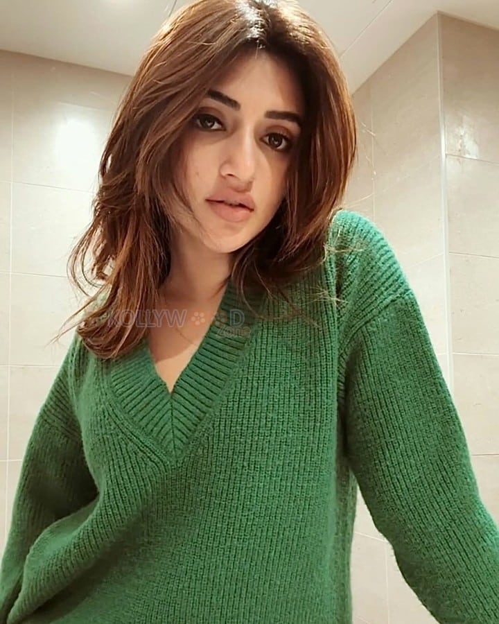 Cute Sreeleela in a Green Ribbed Sweater Photos 02