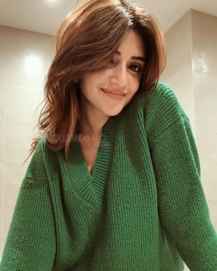 Cute Sreeleela in a Green Ribbed Sweater Photos 03