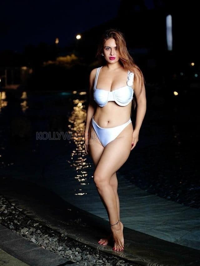 Erotic Beauty Neha Malik in a White Two Piece Lingerie Bikini Photos 03