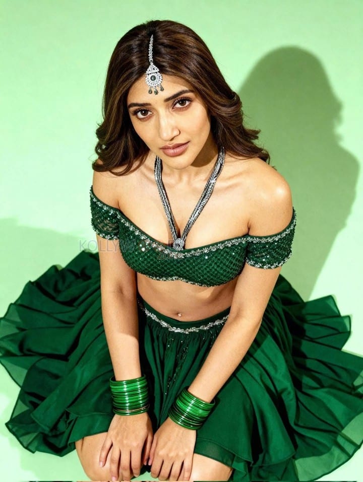 Glamorous Tollywood Actress Sreeleela in a Green Strapless Lehenga Photos 04