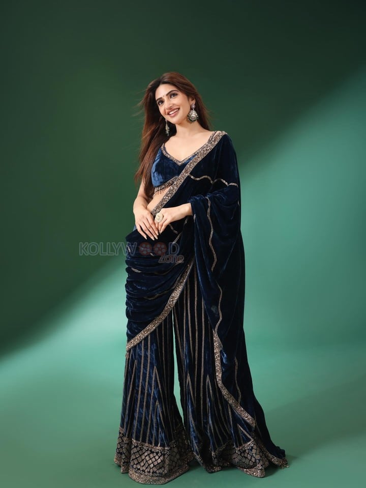 Gorgeous Telugu Actress Sreeleela in a Navy Blue Velvet Saree with Embroidered Sharara Pants Photos 01