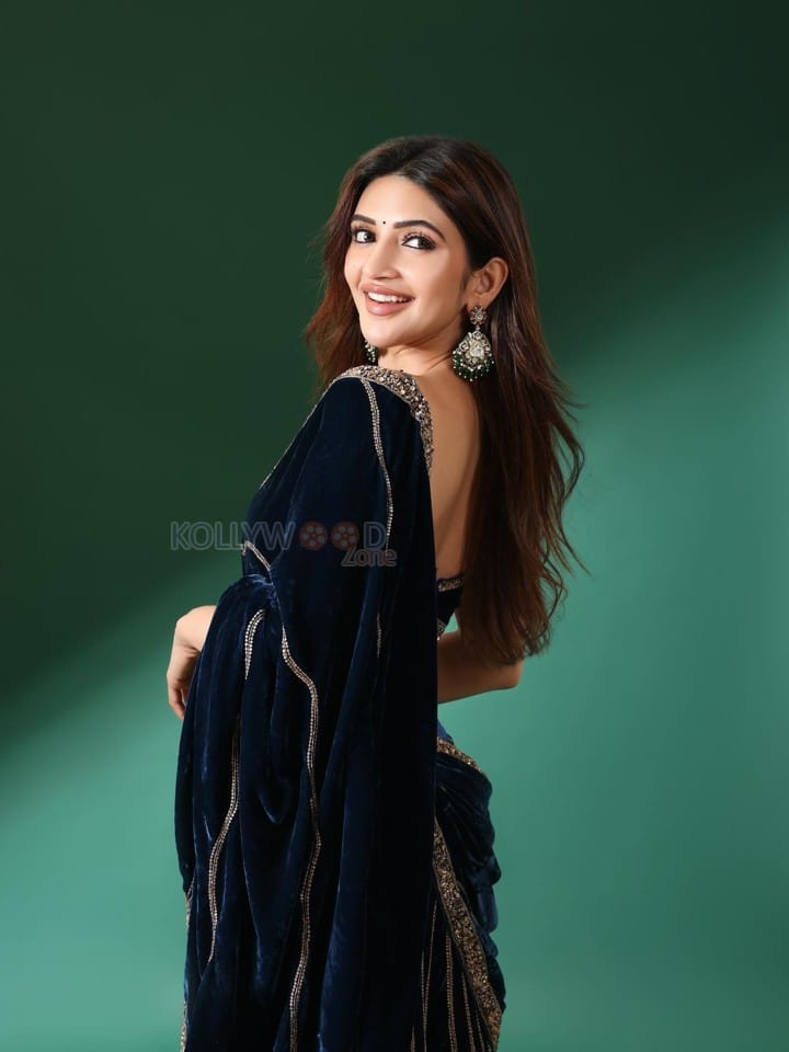 Gorgeous Telugu Actress Sreeleela in a Navy Blue Velvet Saree with Embroidered Sharara Pants Photos 05