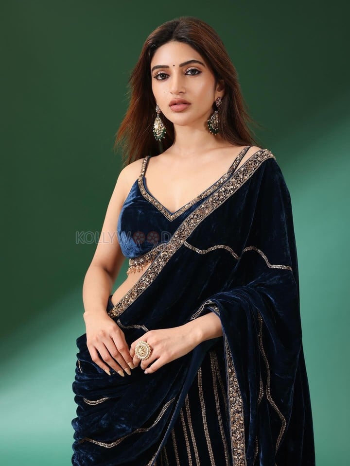 Gorgeous Telugu Actress Sreeleela in a Navy Blue Velvet Saree with Embroidered Sharara Pants Photos 06