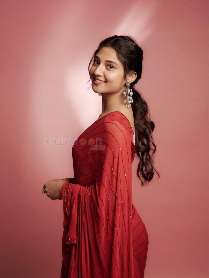 Graceful Ritika Nayak in a Red Saree with a Sleeveless Blouse Pictures 03