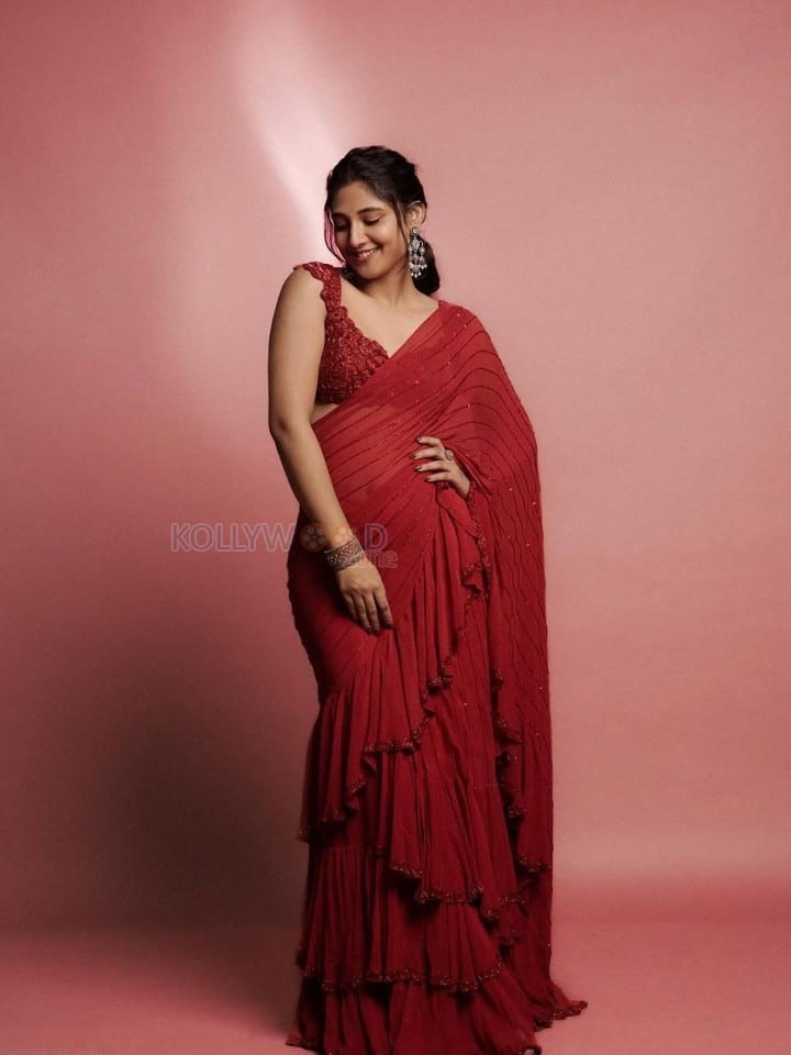 Graceful Ritika Nayak in a Red Saree with a Sleeveless Blouse Pictures 06