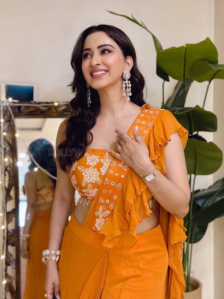 Kya Masti Kya Dhoom Actress Eeshanya Maheshwari in a Stylish Orange Saree Photos 01