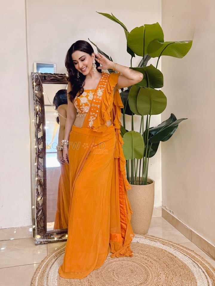 Kya Masti Kya Dhoom Actress Eeshanya Maheshwari in a Stylish Orange Saree Photos 02