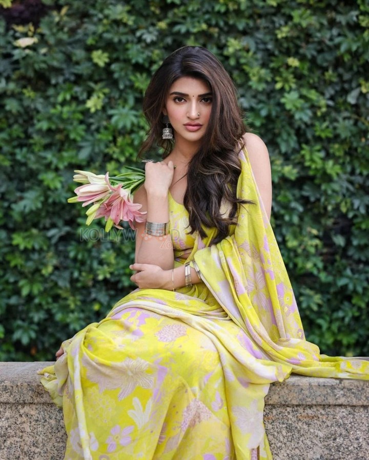 Radiant Sreeleela in a Floral Yellow Saree Photoshoot Pictures 01