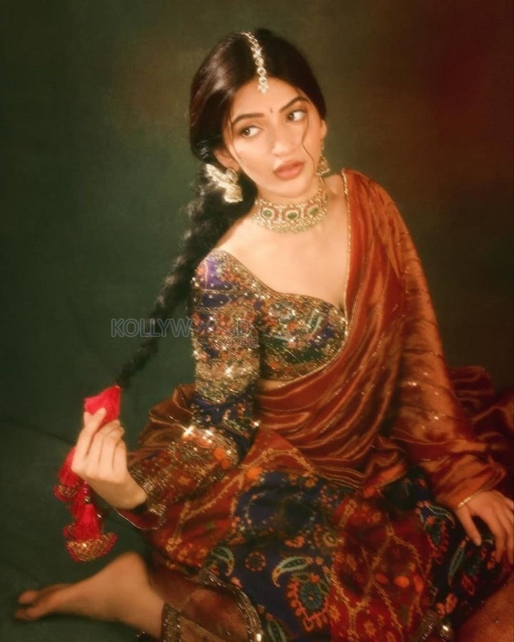Sexy Natural Beauty Sreeleela in a Colourful Radha Inspired Lehenga Photos 01