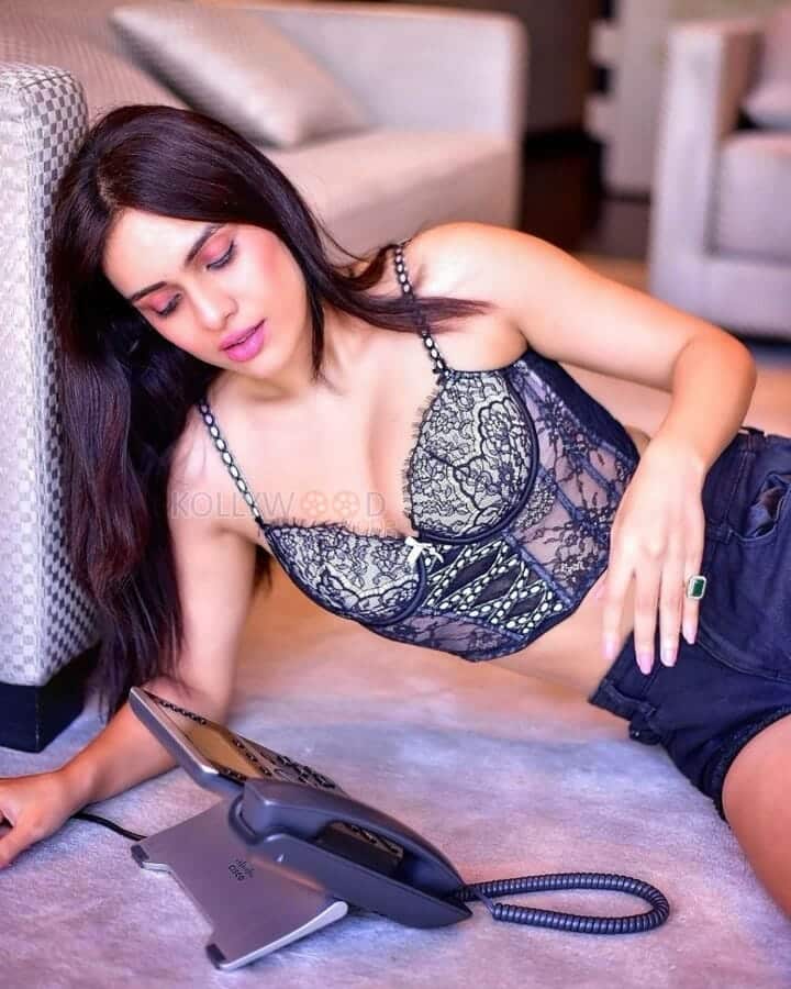 Sexy Neha Malik in a Victoria Secret Black Corset Bra Photos 01