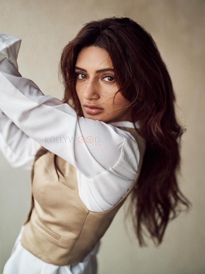 Sexy Sreeleela in a Beige Vest over a White Shirt and Beige Pants Photos 01