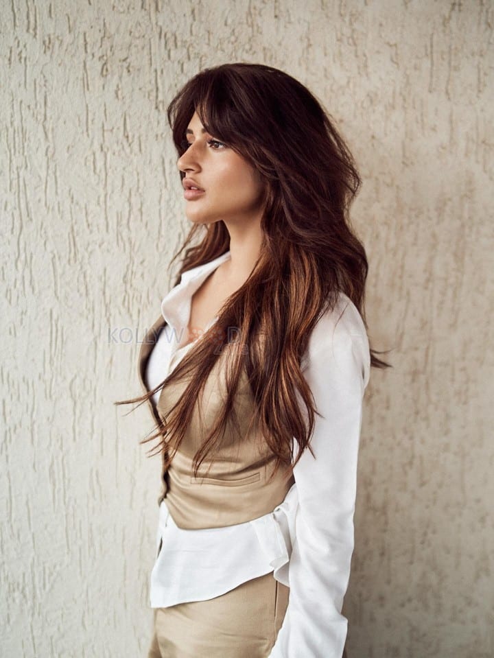 Sexy Sreeleela in a Beige Vest over a White Shirt and Beige Pants Photos 03