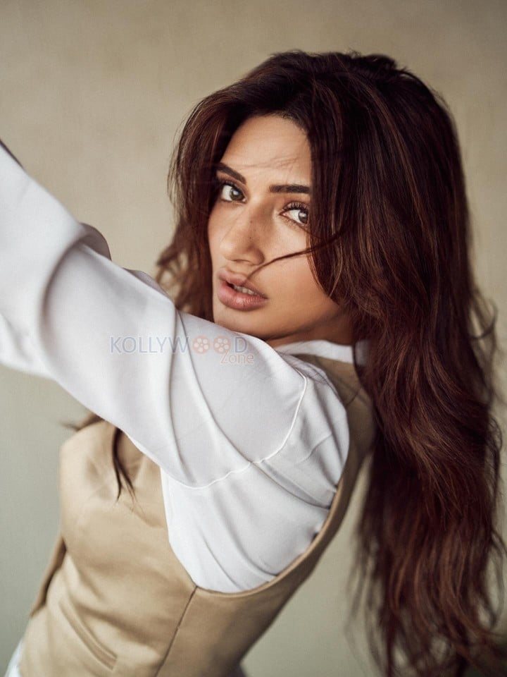 Sexy Sreeleela in a Beige Vest over a White Shirt and Beige Pants Photos 04