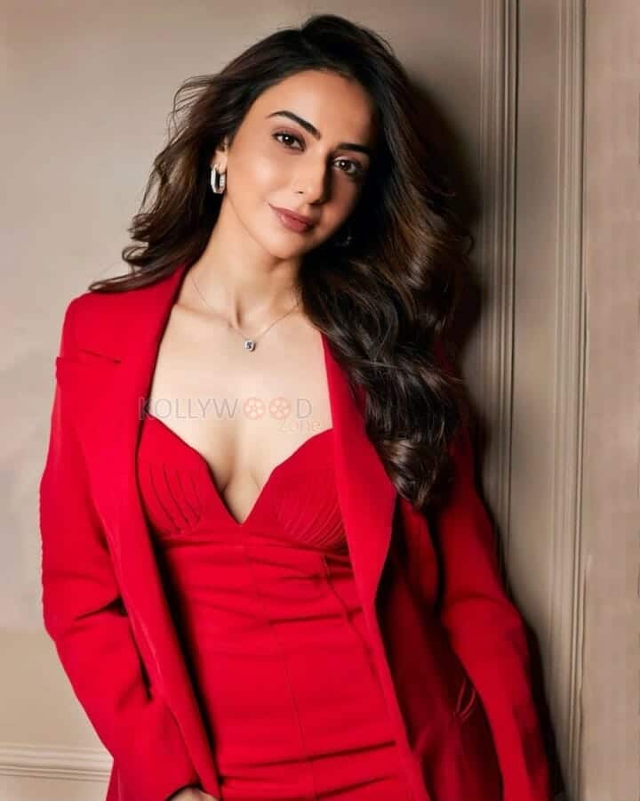 Actress Rakul Preet Singh Showing Cleavage in a Red Dress Photos 02