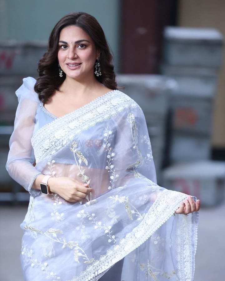 Actress Shraddha Arya in a Pastel Blue Transparent Saree Photos 02