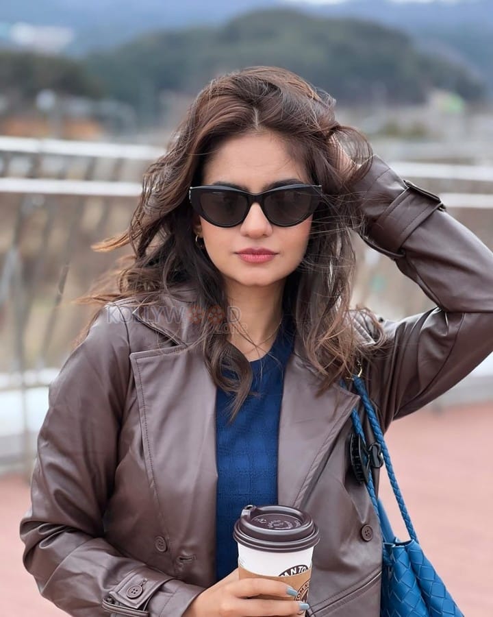 Beautiful Anushka Sen in a Blue Bodycon Dress with a Brown Leather Jacket Photos 03