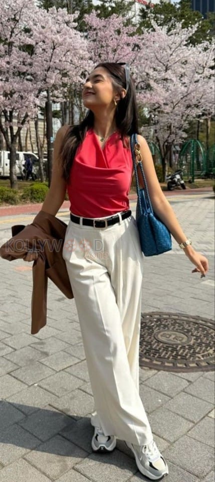 Beautiful Anushka Sen in a Red Halter Top with White Pant Pictures 06