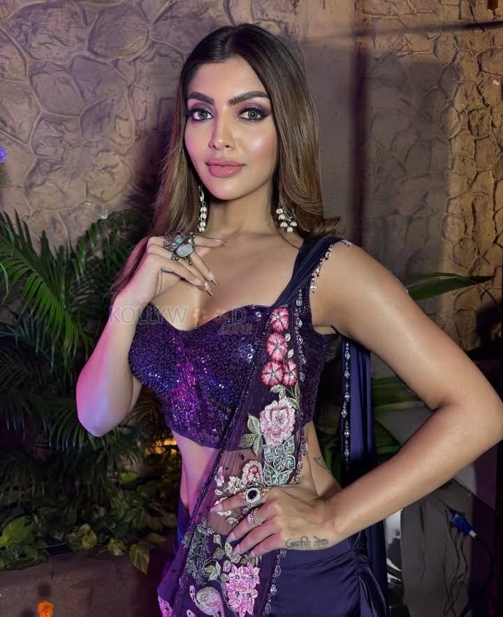 Flawless Akanksha Puri in a Dark Purple Floral Embroidered Saree with Sequined Sleeveless Blouse Photos 03