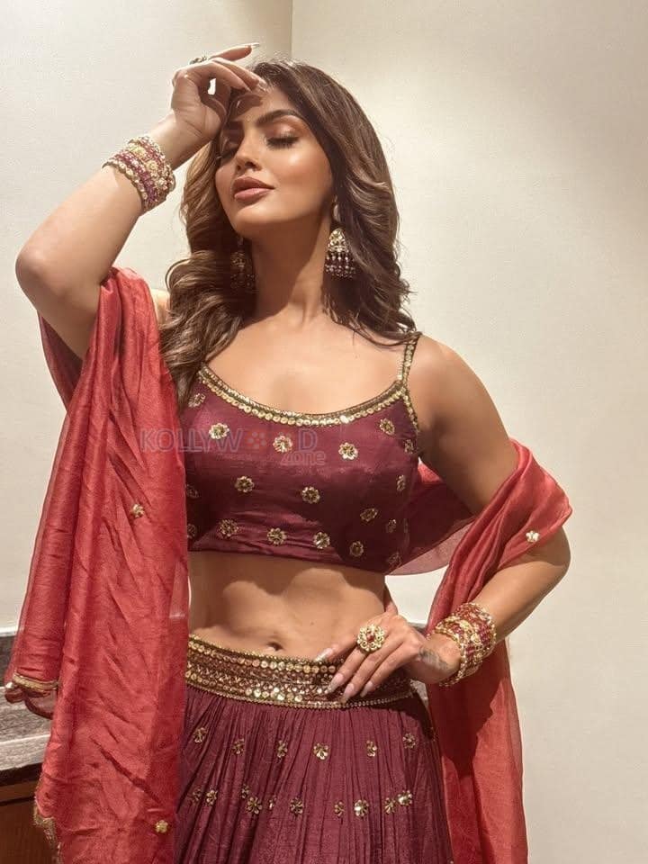 Glamorous Akanksha Puri in a Red Traditional Lehenga Pictures 04