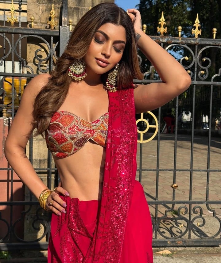 Hot Akanksha Puri in a Red Sequin Saree with a Strapless Bustier Blouse Pictures 04