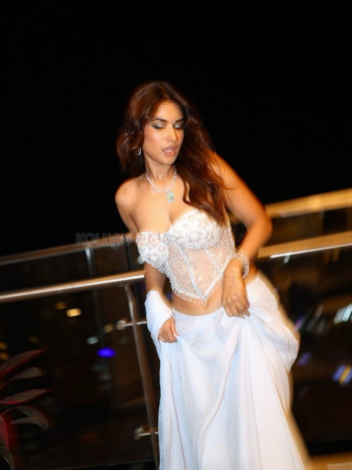 Seductive Nia Sharma in a Pastel Blue Strapless Corset Bralette Style Sequined Saree Pictures 07